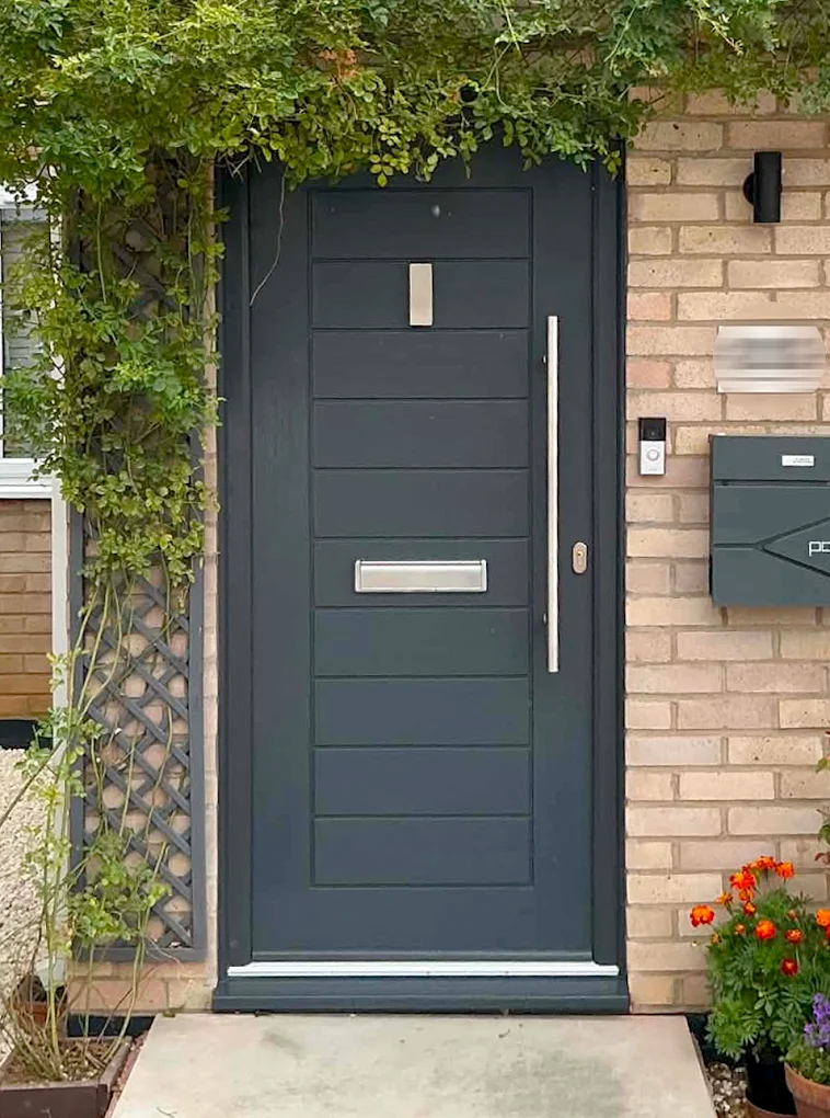 Dark grey modern composite front door, fitted by Glazing Trade Supplies